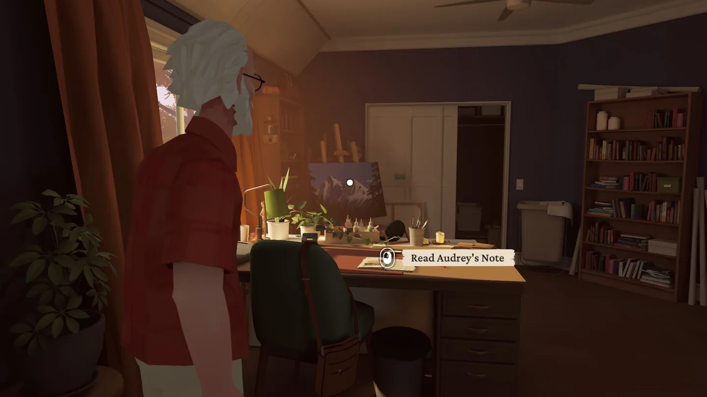 Alfred beside the desk with the Read Audrey’s Note prompt
